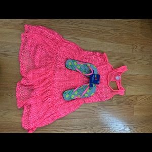Girls pool coverup. Flip flops.